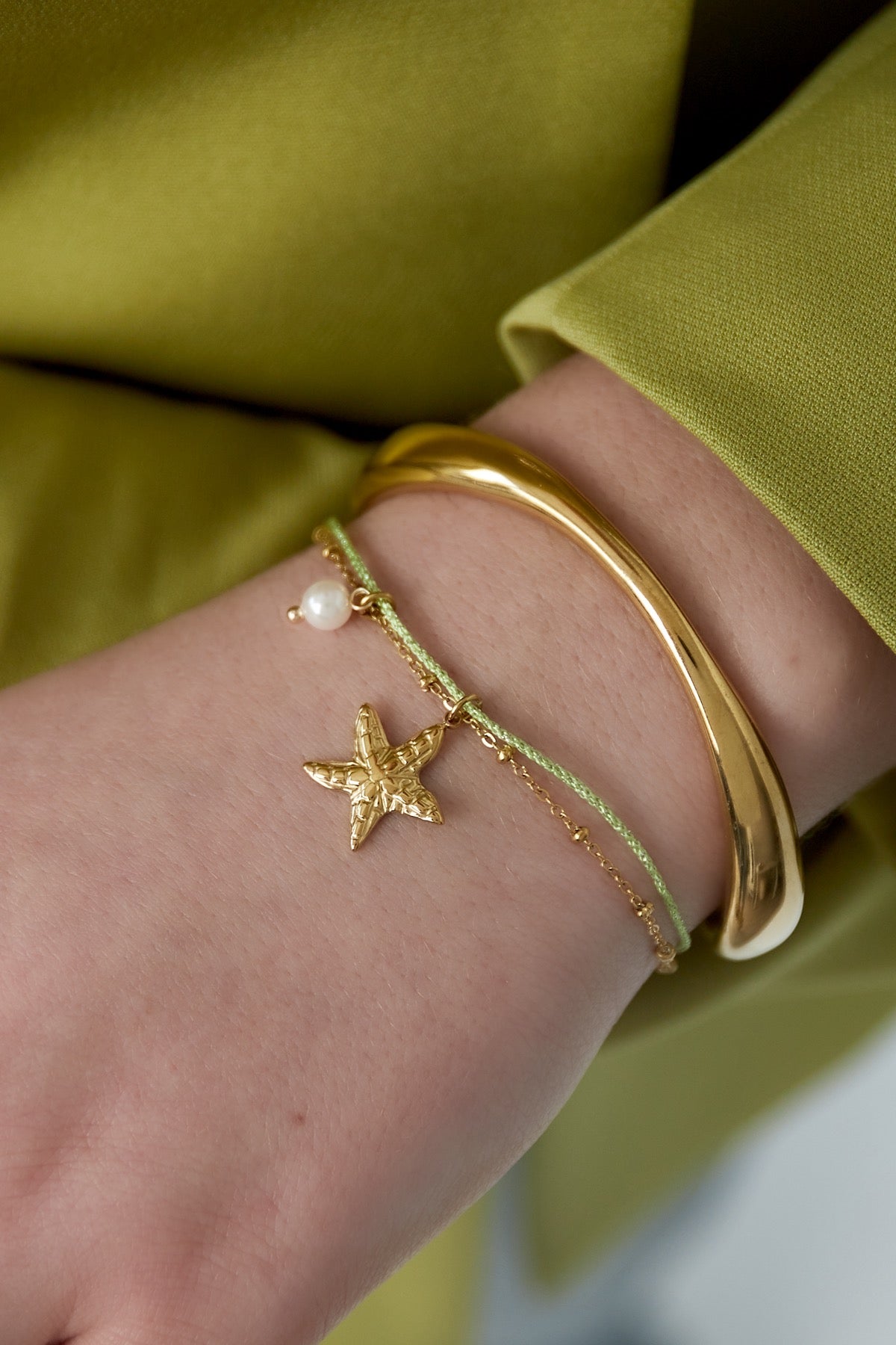 Zeester met parel armband